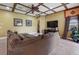 Gathering room boasts a sectional sofa and built-in entertainment center at 10645 Plantation Bay Dr, Tampa, FL 33647