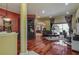 Home office with built-in shelving and hardwood floors at 10645 Plantation Bay Dr, Tampa, FL 33647