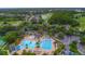 Aerial view of community pool, lap pool, and playground at 10645 Plantation Bay Dr, Tampa, FL 33647