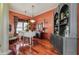 Elegant music room with grand piano and built-in shelving at 10645 Plantation Bay Dr, Tampa, FL 33647
