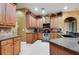 Modern kitchen with stainless steel appliances and granite counters at 10645 Plantation Bay Dr, Tampa, FL 33647