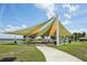 Relaxing waterfront gazebo with shaded seating and picnic tables at 1505 Cedar St, Safety Harbor, FL 34695