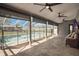 Enclosed patio with a view of the pool and backyard at 15272 Spinning Wheel Ln, Brooksville, FL 34604