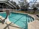 Refreshing pool with a basketball hoop at 15272 Spinning Wheel Ln, Brooksville, FL 34604