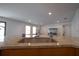 Kitchen island with granite countertop and stainless steel sink at 1708 Abbey Trace Dr, Dover, FL 33527