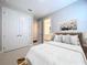 Cozy bedroom with neutral decor and ample closet space at 29456 Velletri Ln, Wesley Chapel, FL 33543