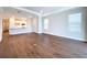 Bright living room with hardwood floors and an open floor plan at 29456 Velletri Ln, Wesley Chapel, FL 33543