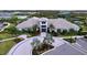 Community clubhouse with landscaping and driveway at 29456 Velletri Ln, Wesley Chapel, FL 33543
