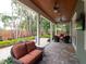 Expansive backyard with comfortable lounge seating, fire pit, and lush landscaping for ultimate outdoor relaxation at 3106 W Bay Villa Ave, Tampa, FL 33611