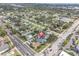 Aerial view highlighting the home's location within a residential neighborhood near water at 3925 1St Ne St, St Petersburg, FL 33703