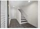 Inviting entryway featuring neutral walls, tile flooring, and a staircase to the upper level at 403 S Oregon Ave, Tampa, FL 33606