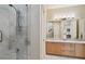 Bathroom with a walk-in shower and double vanity at 602 Guisando De Avila, Tampa, FL 33613