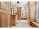 Custom designed walk-in closet with built in shelving and window at 602 Guisando De Avila, Tampa, FL 33613