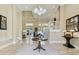 Grand entryway with high ceilings, chandelier, and tile flooring at 602 Guisando De Avila, Tampa, FL 33613