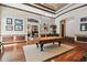 Game room with hardwood floors, pool table and plenty of room for entertainment at 602 Guisando De Avila, Tampa, FL 33613