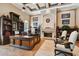 Elegant home office features built-in shelving, fireplace, and large desk at 602 Guisando De Avila, Tampa, FL 33613