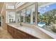 Kitchen with window overlooking pool and backyard at 602 Guisando De Avila, Tampa, FL 33613