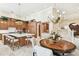 Gourmet kitchen with island, stainless steel appliances, and custom cabinetry at 602 Guisando De Avila, Tampa, FL 33613