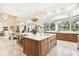 Open kitchen with large island and breakfast bar at 602 Guisando De Avila, Tampa, FL 33613