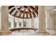 Stunning rotunda landing with a dome ceiling and arched windows at 602 Guisando De Avila, Tampa, FL 33613