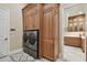 Bright laundry room with washer, dryer, and ample cabinetry at 602 Guisando De Avila, Tampa, FL 33613