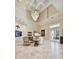 Spacious living room with high ceilings and large windows at 602 Guisando De Avila, Tampa, FL 33613