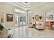 Bright sitting room with French doors opening to the pool area at 602 Guisando De Avila, Tampa, FL 33613