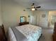 Main bedroom with ceiling fan and ample closet space at 1309 Peachfield Dr, Valrico, FL 33596