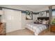 Charming bedroom with a basketball theme and built in closet at 13320 Tropical Breeze Way, Hudson, FL 34669