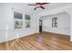 Bright living room with hardwood floors and ceiling fan at 2307 E 11Th Ave, Tampa, FL 33605