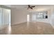 Spacious living room with tile floors and open concept at 27133 Ipswich Dr, Englewood, FL 34223