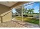 Screened patio overlooking backyard at 27133 Ipswich Dr, Englewood, FL 34223