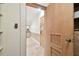 Hallway view with access to kitchen and front door at 36750 Us Highway 19 N # 03127, Palm Harbor, FL 34684