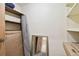 Functional storage room with shelving, a mirror, and concrete walls at 36750 Us Highway 19 N # 03127, Palm Harbor, FL 34684