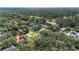Aerial view showcases the property's location near lush greenery and community features at 514 Crestover Dr, Temple Terrace, FL 33617