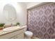 Traditional bathroom with a white vanity, patterned shower curtain, and neutral wall color at 514 Crestover Dr, Temple Terrace, FL 33617