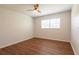 Bedroom with new hardwood floors and natural light at 514 Crestover Dr, Temple Terrace, FL 33617