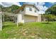 Exterior of the home with patio and minimal landscaping with plenty of room to expand at 514 Crestover Dr, Temple Terrace, FL 33617