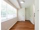 Eat-in kitchen featuring lots of natural light and two storage closets at 514 Crestover Dr, Temple Terrace, FL 33617