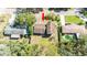 Aerial view showcasing the home's location, driveway, and surrounding landscape at 514 Crestover Dr, Temple Terrace, FL 33617
