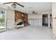 Living room with fireplace, currently under renovation at 5181 Horseshoe Ne Pl, St Petersburg, FL 33703
