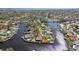 Aerial view of waterfront home with private dock and pool at 5181 Horseshoe Ne Pl, St Petersburg, FL 33703