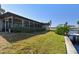 Landscaped backyard with canal access and private dock at 5181 Horseshoe Ne Pl, St Petersburg, FL 33703