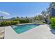 Inviting rectangular pool with surrounding patio at 5181 Horseshoe Ne Pl, St Petersburg, FL 33703