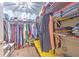 Large walk-in closet with plenty of shelving and hanging space at 555 Calico Scallop St, Ruskin, FL 33570