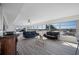 Bright living room with hardwood floors and water views at 6363 Gulf Winds Dr # 437, St Pete Beach, FL 33706