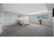 Bright bedroom with hardwood floors and large windows at 6363 Gulf Winds Dr # 437, St Pete Beach, FL 33706