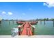 Community boardwalk leads to a relaxing dock at 6363 Gulf Winds Dr # 437, St Pete Beach, FL 33706