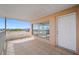 Relax on this private balcony featuring tile flooring and a convenient entry door at 6363 Gulf Winds Dr # 437, St Pete Beach, FL 33706