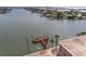 Community dock on the water with seating area at 6363 Gulf Winds Dr # 437, St Pete Beach, FL 33706